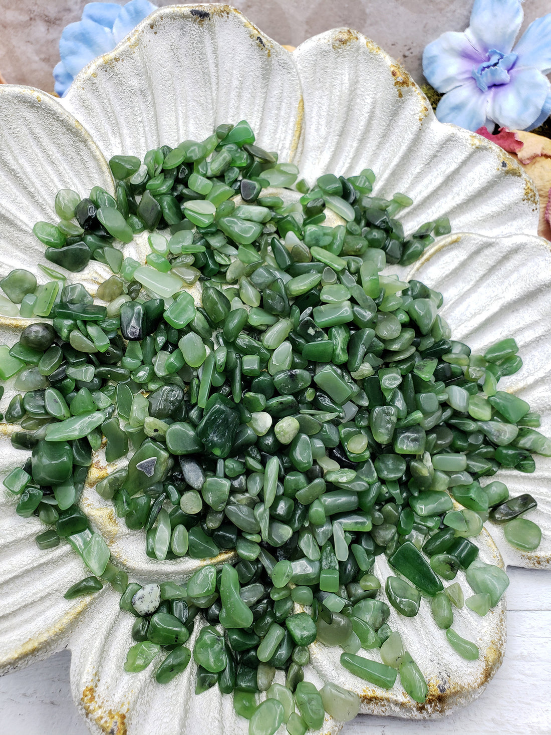 Seven ounces of nephrite jade chips on display