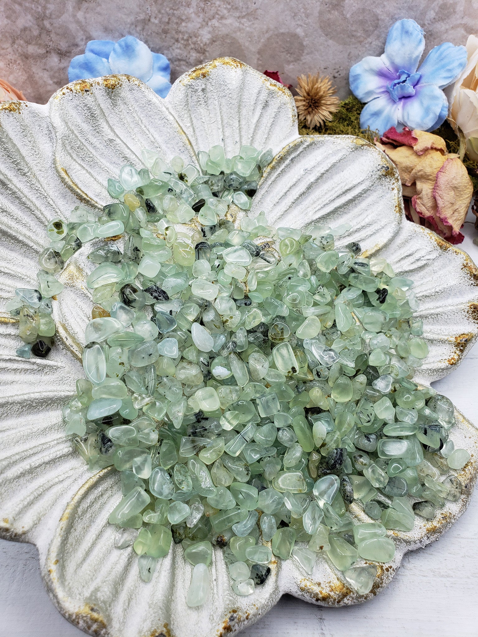 Seven ounces of prehnite chips on display