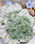 Seven ounces of prehnite chips on display