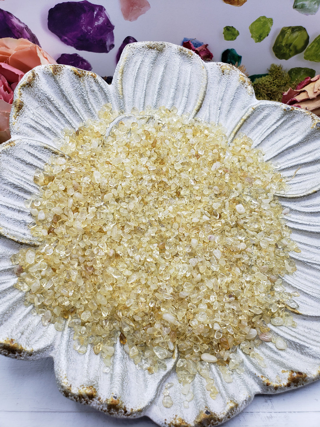 seven ounces of citrine stone chips on floral dish display
