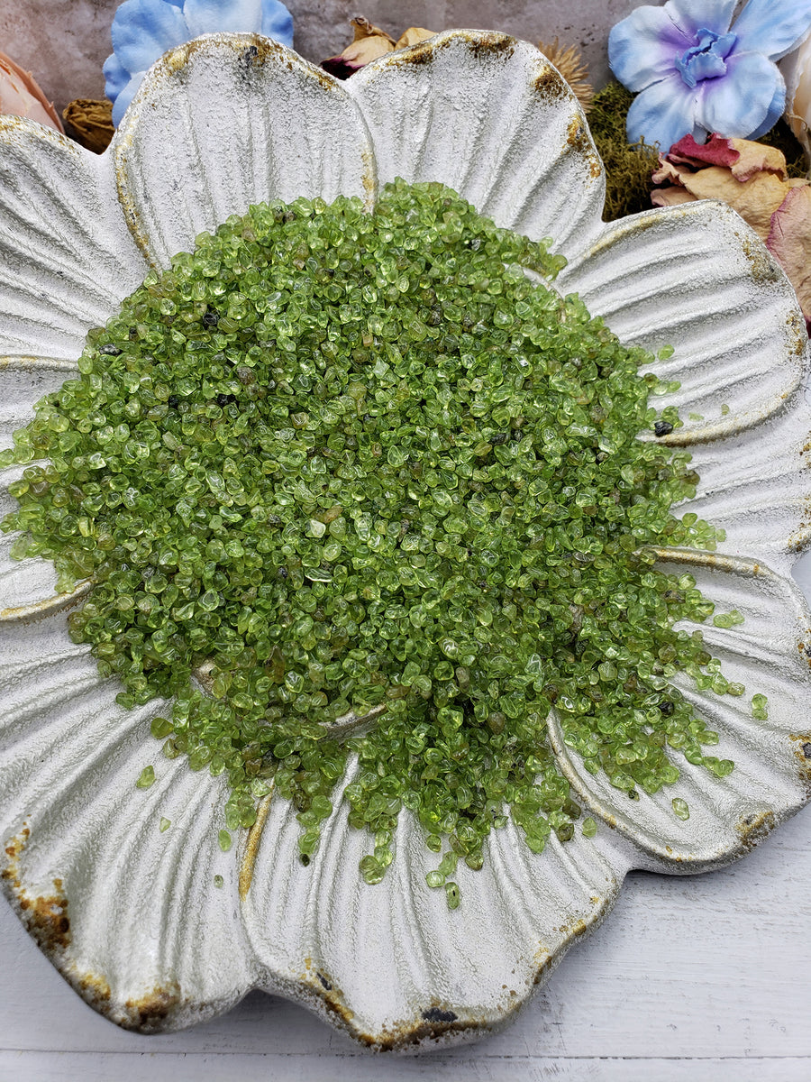 seven ounces of peridot stone chips on display