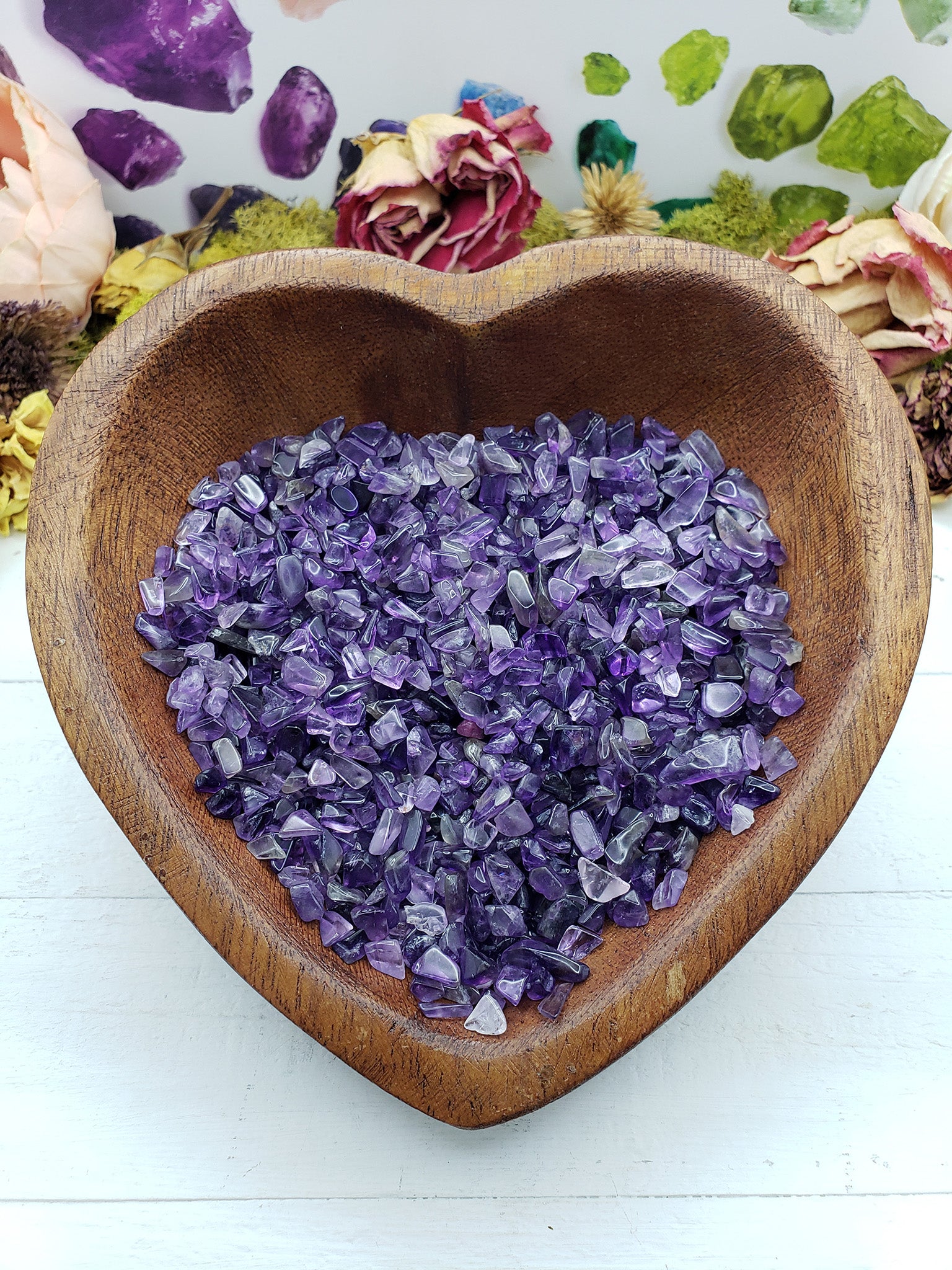 eight ounces of amethyst chips in wooden bowl