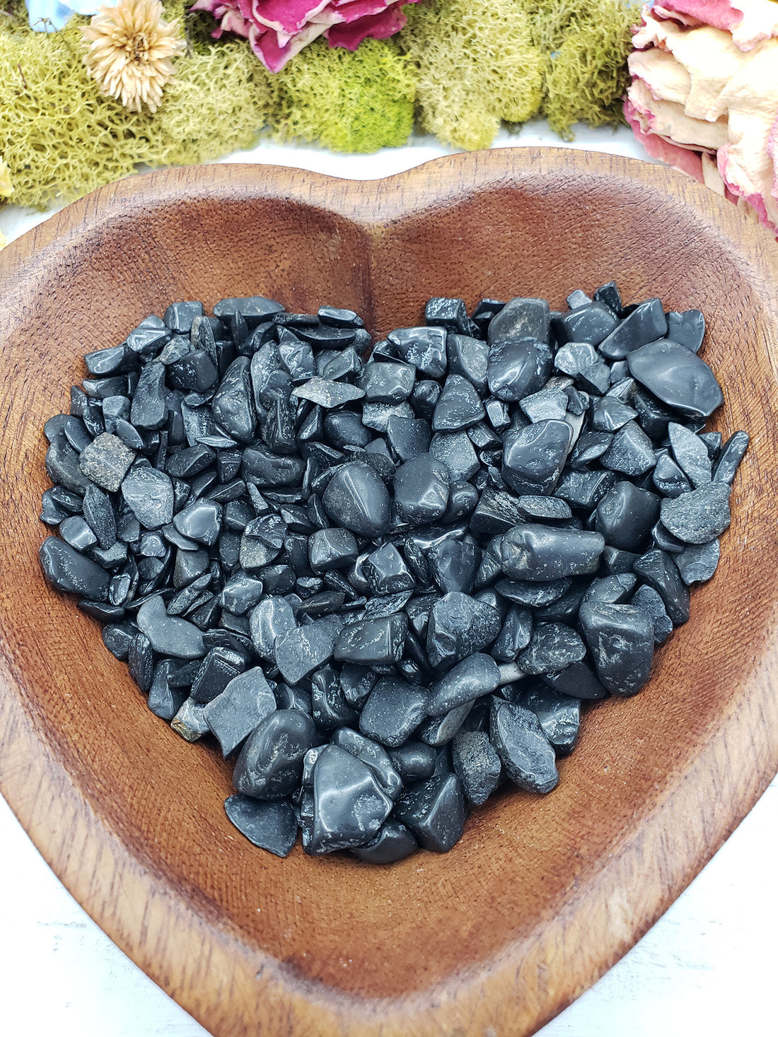 eight ounces of black tourmaline in wooden bowl