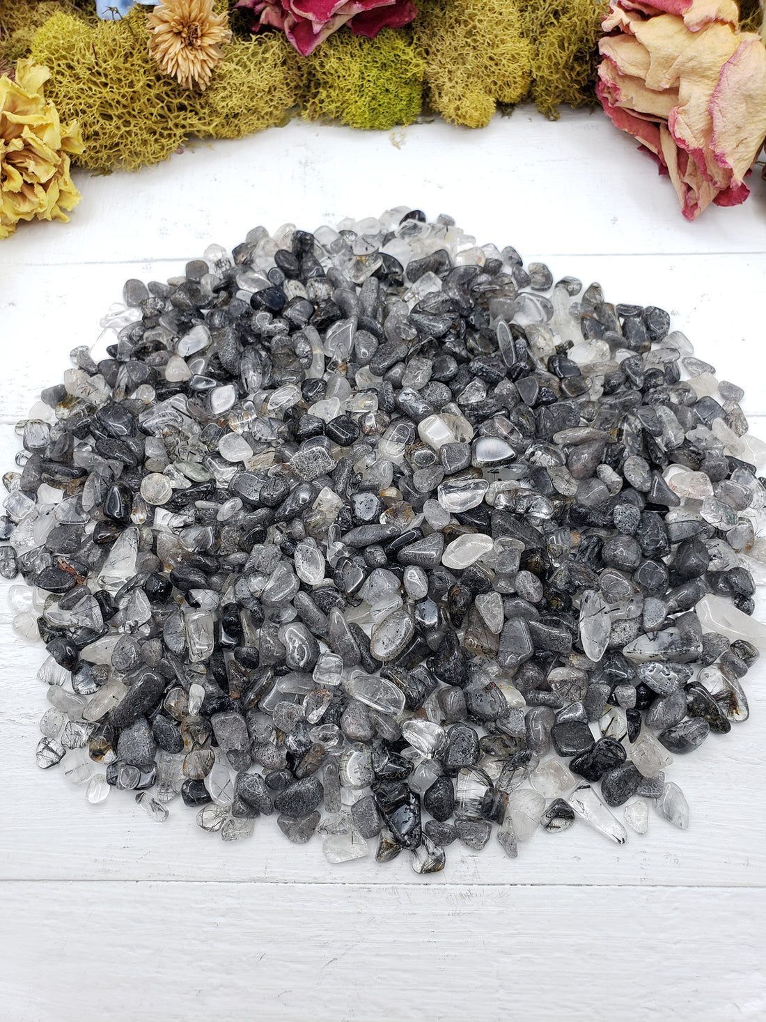 eight ounces of black tourmaline rutilated quartz on display