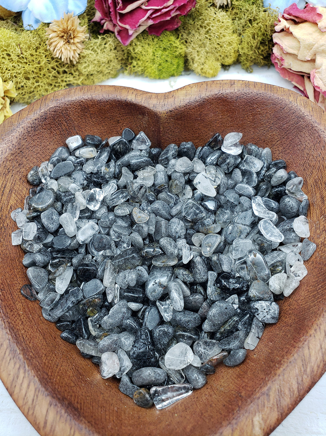 eight ounces of black tourmaline rutilated quartz in wooden bowl
