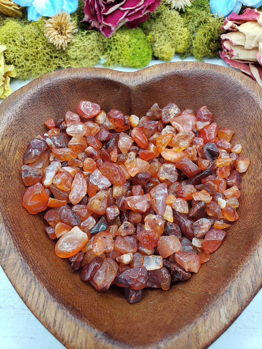 eight ounces of carnelian in wooden bowl