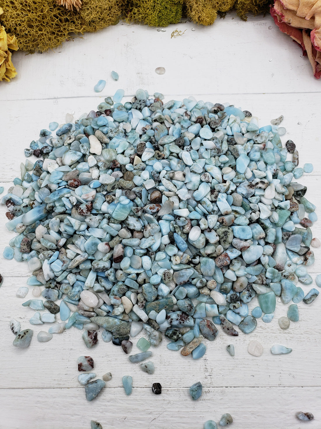 Eight ounces of larimar stone chips on display