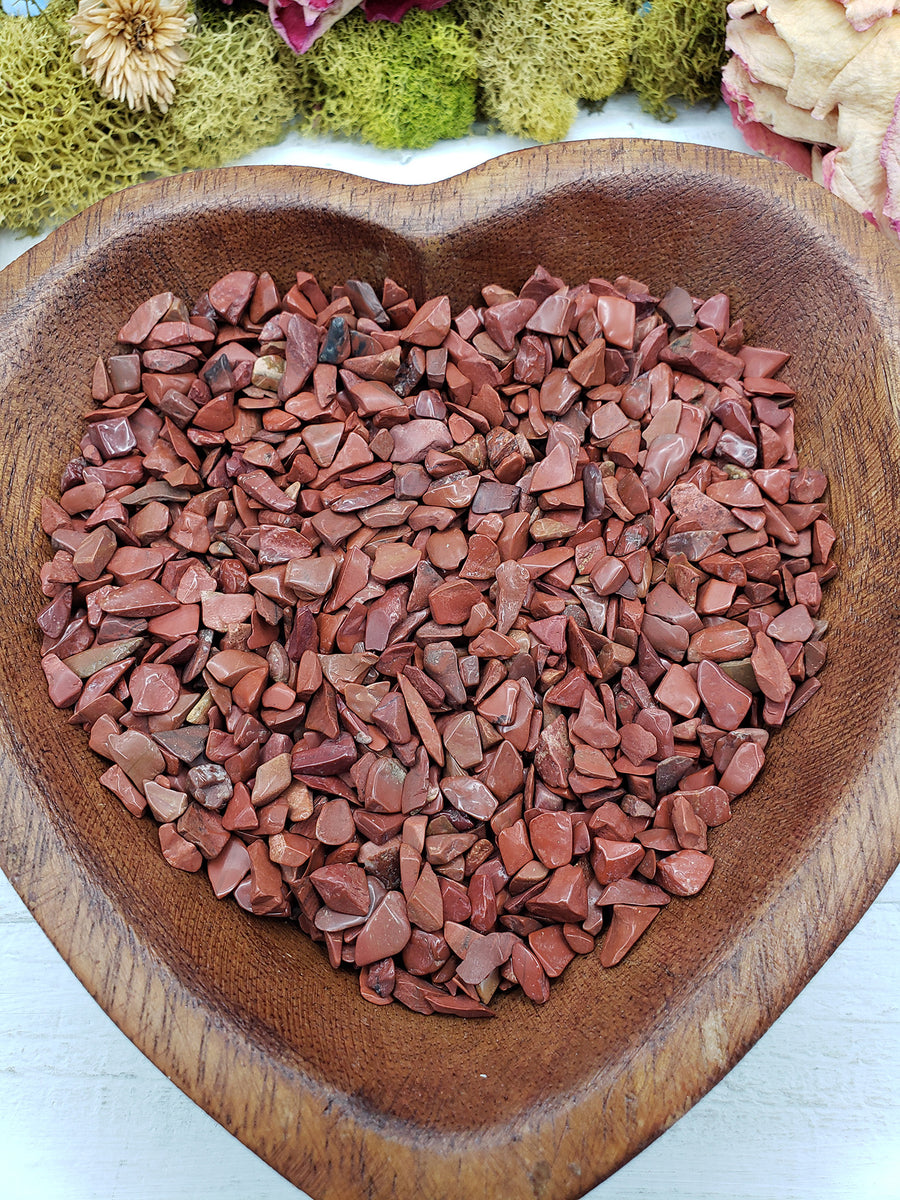 eight ounces of red jasper stone chips in wooden heart bowl