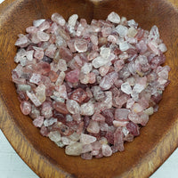 eight ounces of strawberry quartz chips in wooden bowl