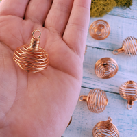 Copper-Colored Metal Spiral Cage Ornament Pendant - Perfect for Holding Gemstones or Orbs! - In Hand