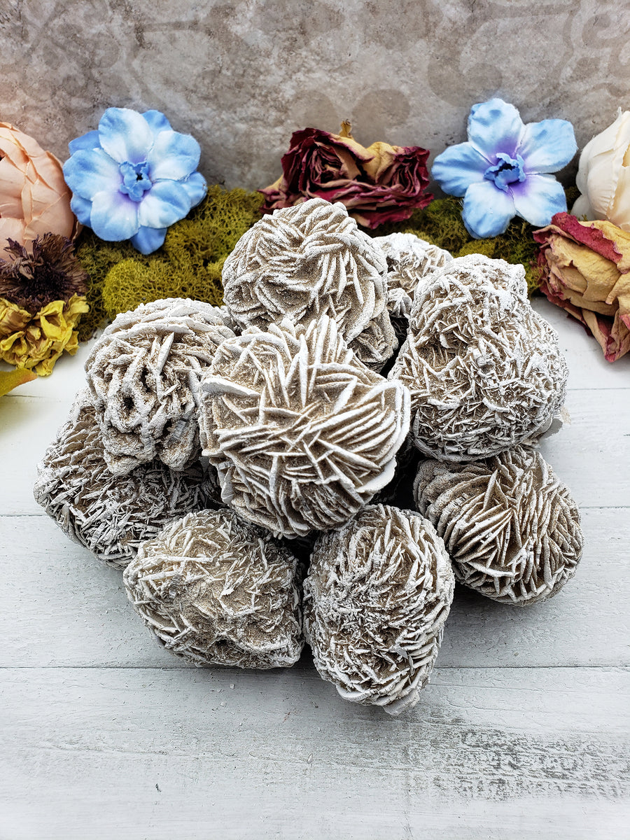 selenite desert rose crystals on display