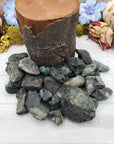 rough rough emerald stone pieces by prop log