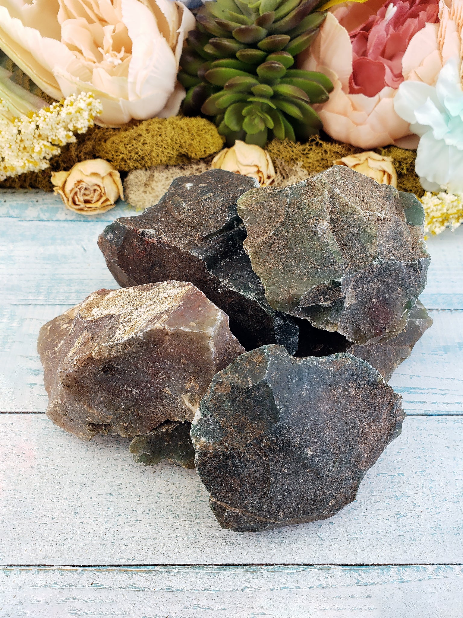 rough fancy jasper stones on display