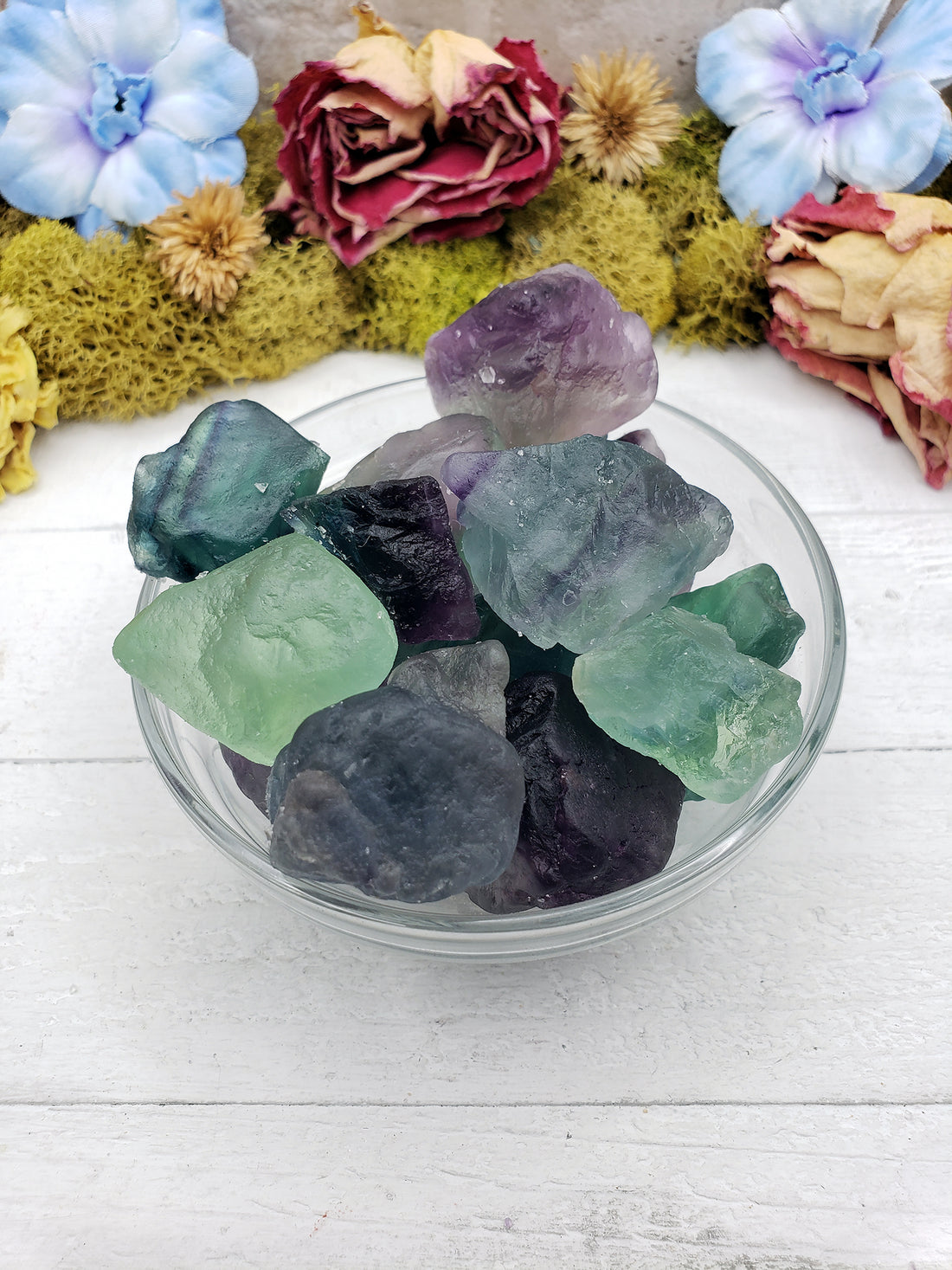 rough fluorite crystal pieces in bowl