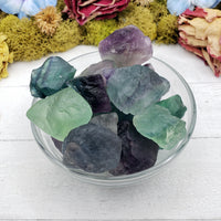 rough fluorite crystal pieces in bowl