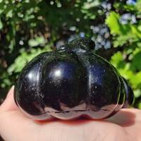 Large Obsidian Gemstone Happy Pumpkin Totem Jack-o-Lantern Carving - Close Up of Split