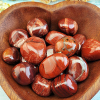 tumbled red silver leaf jasper stones in heart bowl