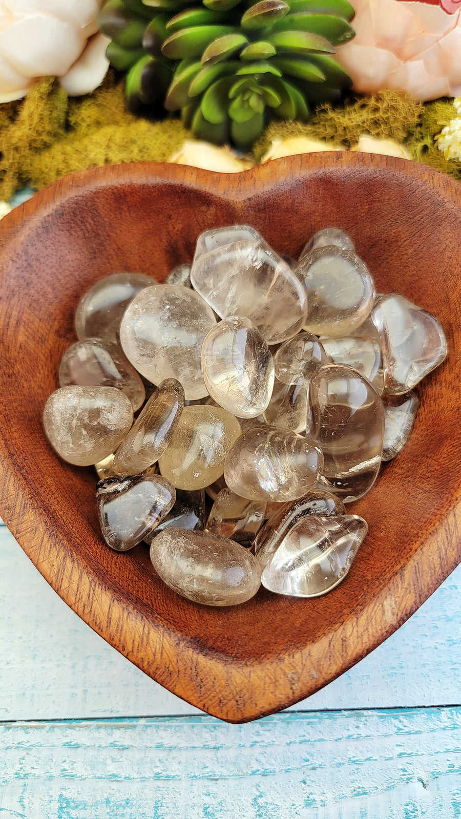 tumbled smoky quartz stones in wooden heart bowl