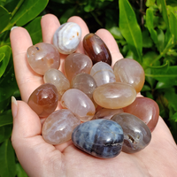 snakeskin agate crystals in hand