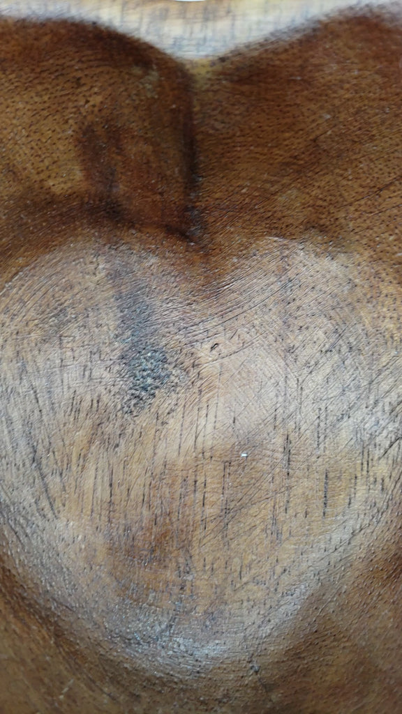 Video of bronzite chips being poured into a wooden bowl